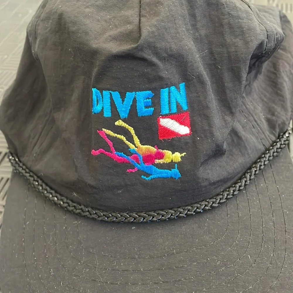 Dive In norwegian cruise cap. black one size adjustable back strap